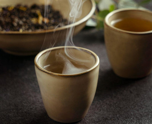 kava tea steaming in a cup
