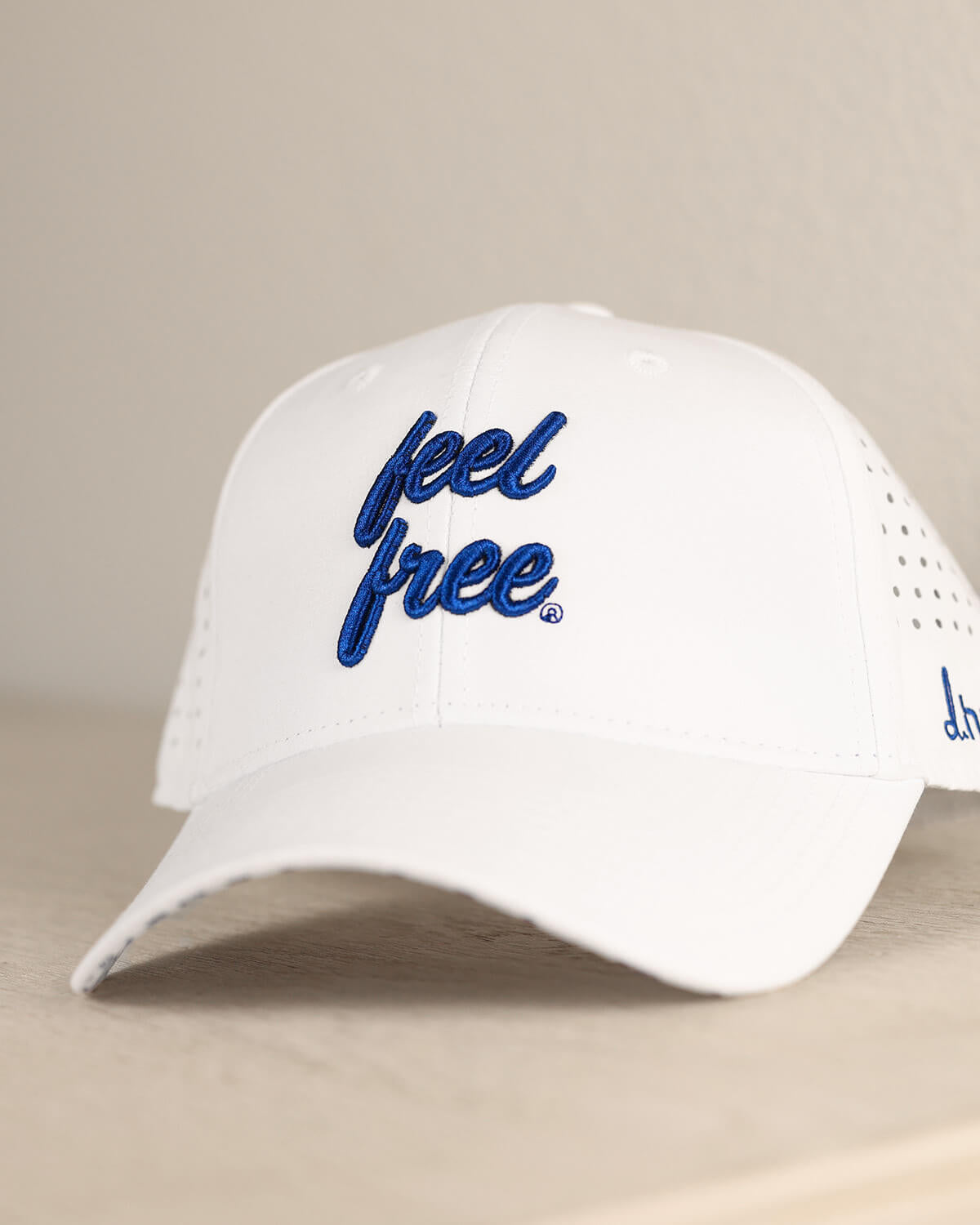 feel free x d.hudson Hat - White + Blue Logo